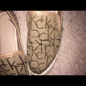 CALVIN KLEIN SLIP ONS